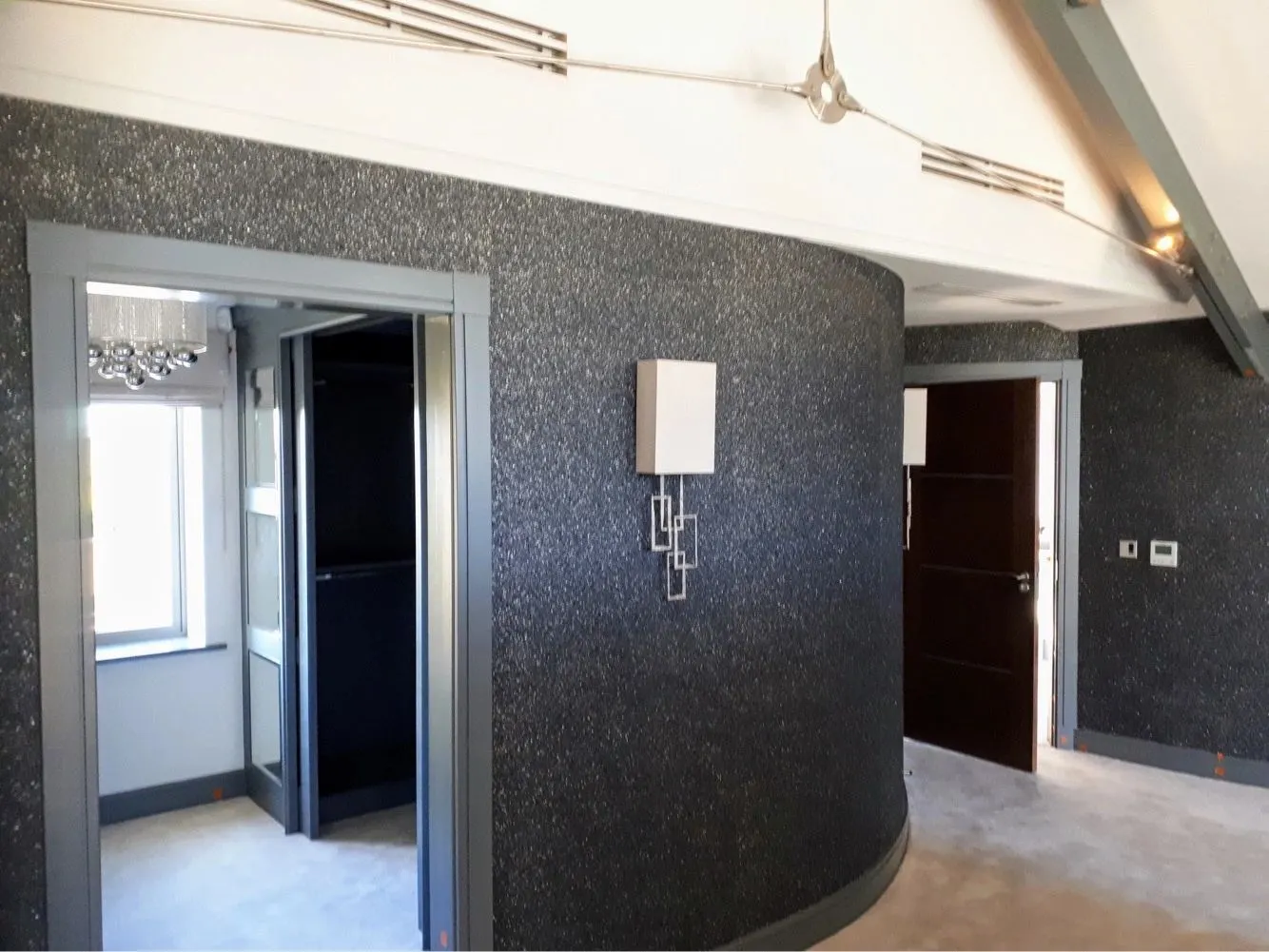 Curved textured feature wall finish in a commercial building, Yorkshire